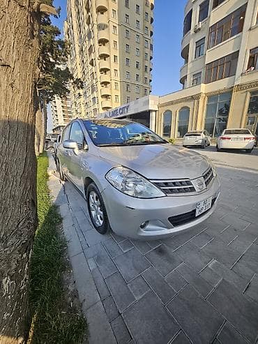 benzin bakı: Nissan Tiida: 1.6 l | 2008 il Sedan — 6