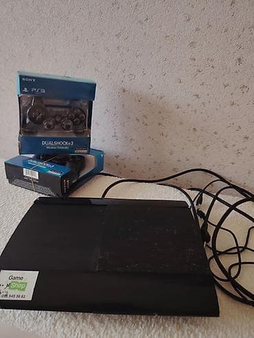 var box: Sony PlayStation 3 Super Slim konsolu + 2 ədəd DualShock 3 simsiz pult — 3