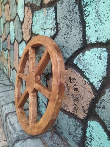 Xalçalar: Dekorativ araba təkəri əl işçiliyi ilə şam ağacından hazırlanıb — 2