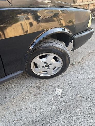 bmw diskləri: Tofaş doğan diskləri disk təkər biryerdə 4 ədəd təkərlərin şporuna — 2