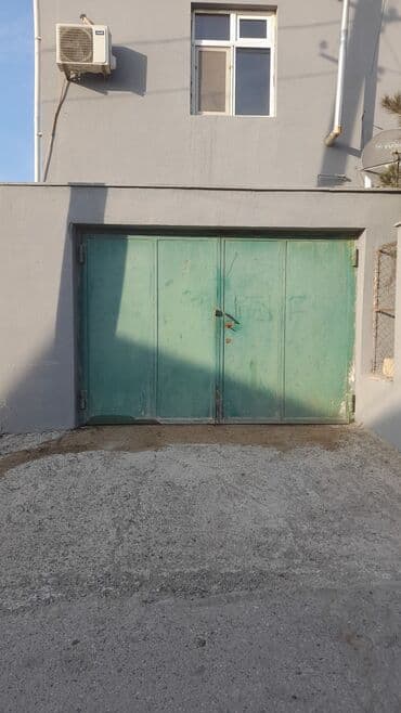 Məhsul: Metal qaraj qapısı Təsvir: - Material: polad/metal