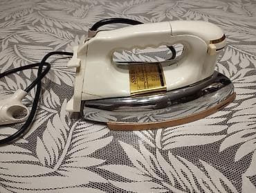 tefal utu: Məhsul: Elektrik ütü Təsvir: - Klassik dizaynlı elektrik ütü, parlaq — 2