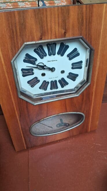 Divar saatları, Mexaniki, Mayatnik