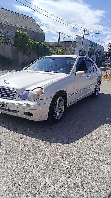 porsche disk: Mercedes-Benz C-Class: 2.2 l | 2001 il Sedan — 5
