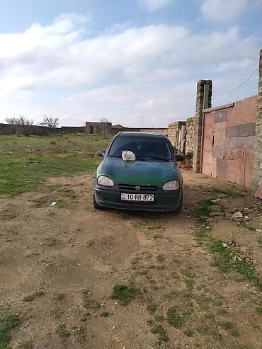 opel karopka: Opel Corsa B, yaşıl rəng, hetçbek gövdə. Texniki xüsusiyyətlər: - — 1