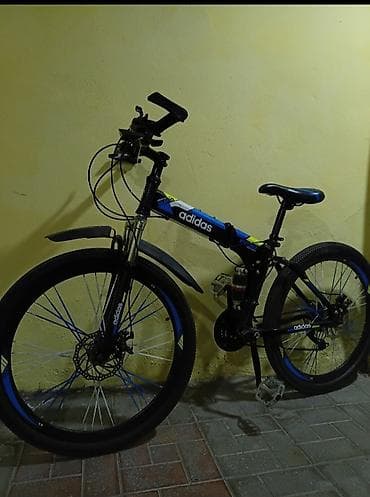 Velosiped – dağ/şəhər tipli, qatlanan (folding) gövdə - Brend işarəsi — 1