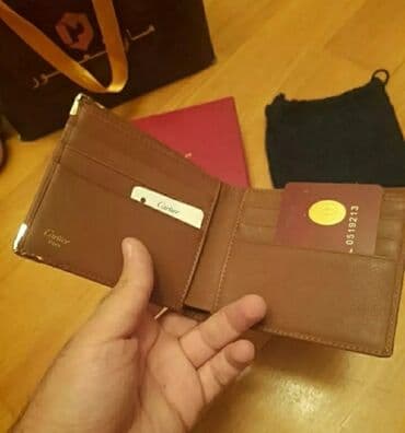 Cartier portmane 120 manata alinib yenidir lalafo.az -da Cartier portmane 120 manata alinib yenidir