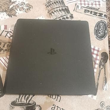 Elektronika: Sony PlayStation 4 Slim oyun konsolu Paketə daxildir: - PS4 Slim — 2