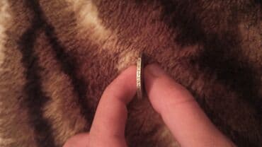 gerbli 10 qəpik: Salam 1922-ci ilin 50 qəpiklik sikkəsidi. Texminen 10 qramdi — 4