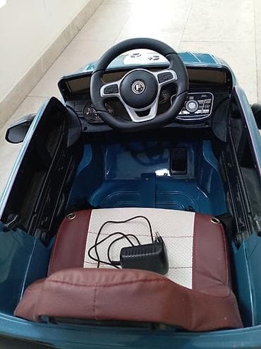 Uşaq üçün elektrikli minik maşını Rəngi Mavi Pult və zaryatqa daxil — 2