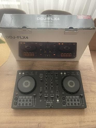 Музыкальные инструменты: Pioneer DJ DDJ‑FLX4 DJ kontrolörü - 2-dekli, mərkəzdə mikser bölməsi — 2