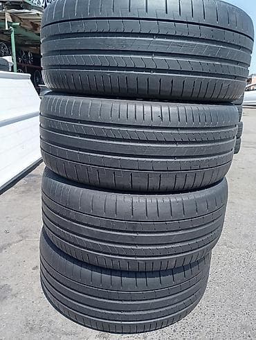 disk lada: 275/40/22 Almandan gelme Pirelli yay–yaypaq protektor naxışlı şinlər — 1