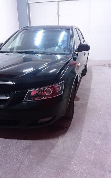 Hyundai Sonata: 2.4 l | 2006 il Sedan — 4