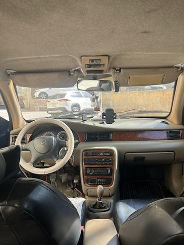 pencere tutacağı: İcarə/satış üçün sedan avtomobil (Iran Khodro Samand/Peugeot — 8