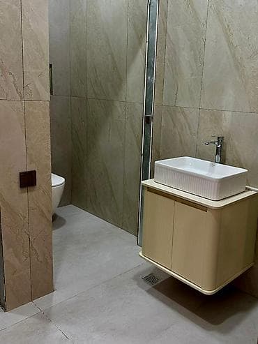 aşağda: Kooperasiya universitetinin yanında, əsas yola baxan, ümumi sahəsi 103 — 7
