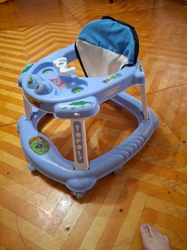 Uşaq geyimi və ayaqqabıları: Mavi rəngdə Topoly markalı uşaq gəzdiricisi. Rahat oturacaq hissəsi və — 2