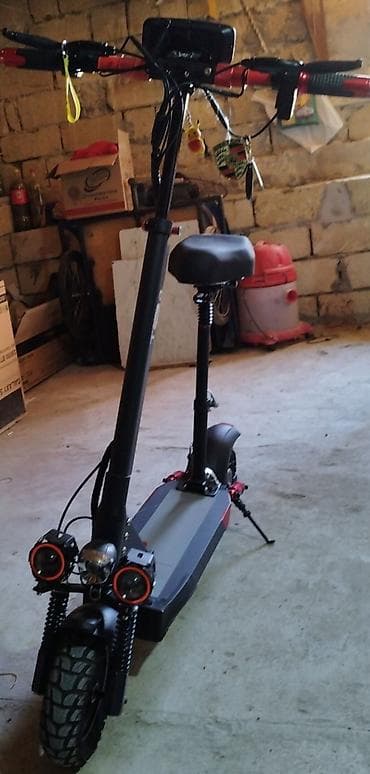 електро велосипед: Elektrikli skuter – güclü ikili amortizasiya və iri təkərlər — 1