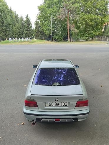 nissan skyline r34: BMW 5 series: 2.8 l | 1996 il Sedan — 8