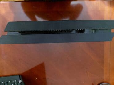 kabel 4: Playstation 4 Fat •Jail Break playstation •1 tb yaddaş •11 oyun •GTA 5 — 3