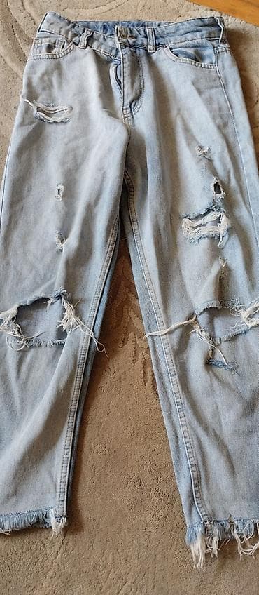 saat kişi ucun: Məhsul: Açıq mavi “ripped” stil cins şalvar - Model: Hərəkətli cırıq — 1
