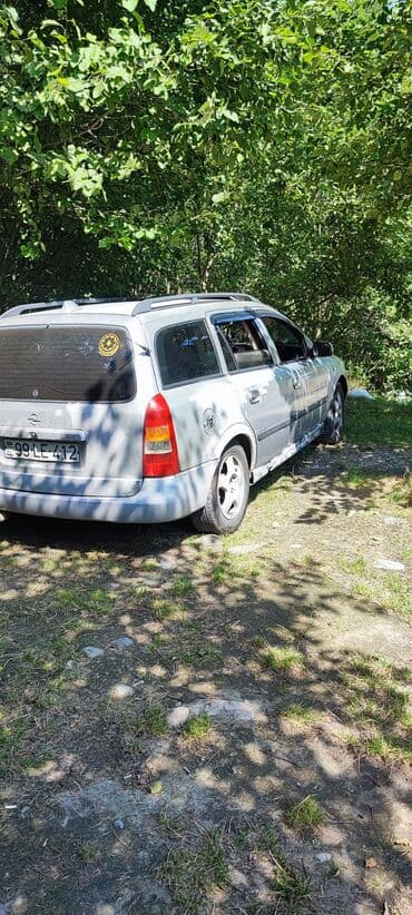 xanımlar ucun maşınlar: Opel Astra: 1.6 l | 1998 il Universal — 5
