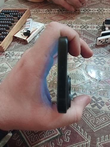 muzukalni centir: IPhone 15, Qara, Face ID — 1