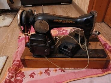 paltar tikən masin: Elektriklə işləyən klassik tikiş maşını - Korpus: metal, qara rəngli — 2