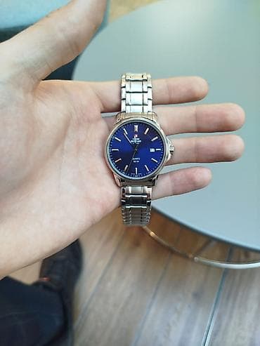 Zərgərlik əşyaları: Qol saatı, Swiss — 1