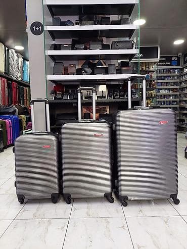 İdman və istirahət: Sərt korpuslu gümüşü rəngdə 3-lü çamadan dəsti - Material: yüngül və — 1