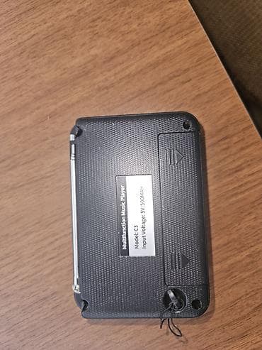 3 birinde printer: Kompakt portativ musiqi çaları və FM radio Xüsusiyyətlər: - Model: C3 — 4