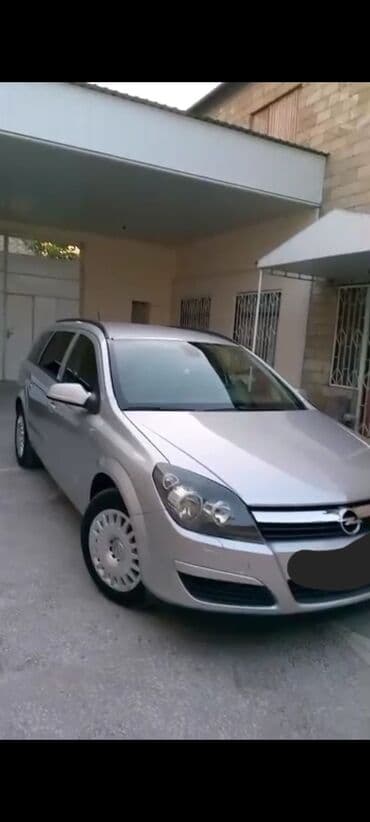 lipa nomrələr: Opel Astra Caravan (Universal) – gümüşü rəng İli 2006 probeq 234000 — 1