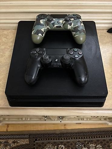 pleys: PlayStation 4 Slim oyun konsolu Xüsusiyyətlər: - Rəng: qara, yığcam — 5