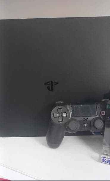 ucuz telfon: Sony PlayStation 4 (PS4) Slim oyun konsolu - Rəng: mat qara - — 1