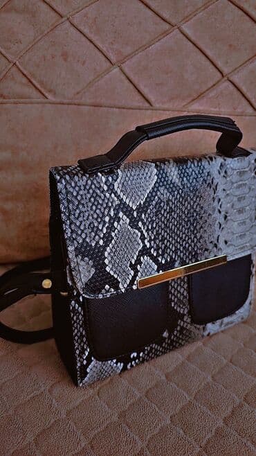 Əl çantası, İşlənmiş