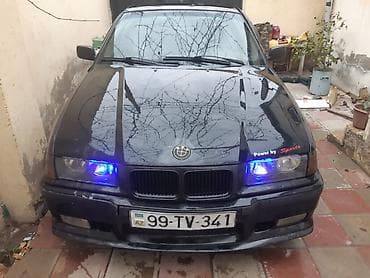 BMW 3 Series E36 sedan – qara rəng, sport üslublu ön bamper və “Power