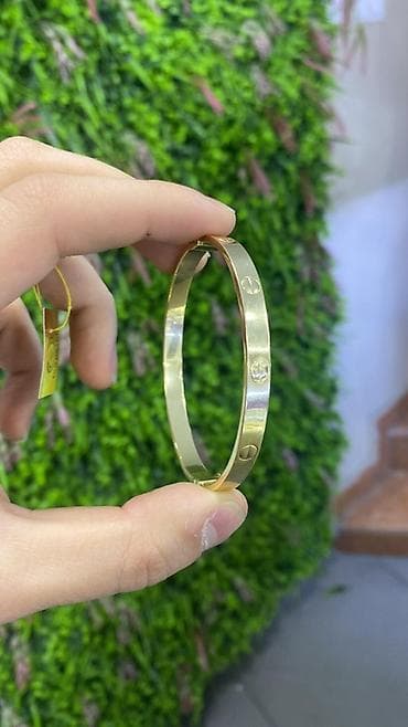 dini uzukler: Dəstə daxildir: Üzük, Cartier, Sarı qızıl, 585 Əyar, 10 g — 9