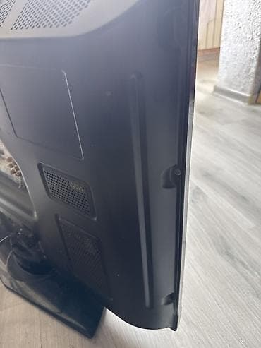 LG televizor – klassik model, masaüstü dayaqlı. Ölçü: təxminən 32–37 — 2