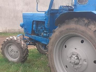 turbo az traktorlar: Mavi rəngdə kabinəli kənd təsərrüfatı traktoru. Xüsusiyyətlər: - — 7