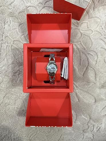 saat ev: Yeni, Qol saatı, Swatch — 3