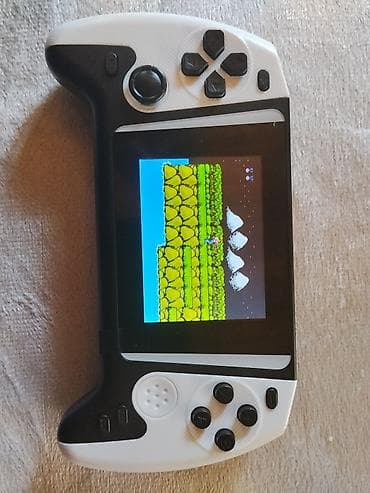 predator notebook qiymeti: Portativ retro oyun konsolu - Korpus: ağ-qara, ergonomik “gamepad” — 2