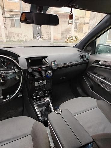 doogee dg550 dagger: Opel Astra: 1.6 l | Hetçbek — 5