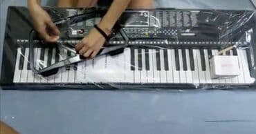 uşaq ucun qulaqlıq: Yeni öyrənənlər üçün. 5 oktava, 61 klaviş 255 cür səs tonları 255 — 3