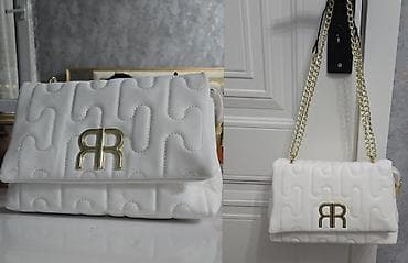 Çox keyfiyyetli ag çanta.1 eded qalib.Ölçüsü 27×18