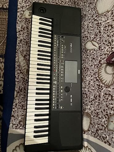 Sintezator, Korg — 1