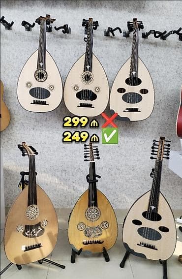 gitara sekilleri: Ud musiqi aləti qısaboyunlu leyta tipli, armudvari ladsız simli — 1