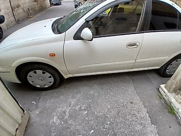 ford focus 2001: Nissan Sunny: 1.3 l | 2007 il Sedan — 3