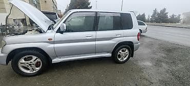 cip maşin: Mitsubishi Pajero iO (GDI) –2002 1.8 kompakt 4x4 şəhər/kəndetrafı SUV — 4