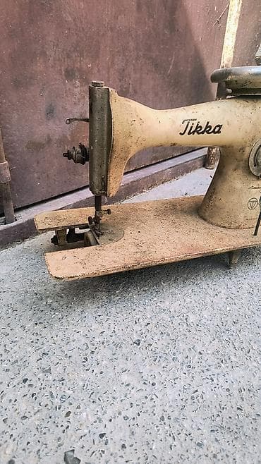 qolf masini: Məhsul: Tikka tikiş maşınının gövdəsi (mexaniki, vintaj model) — 1
