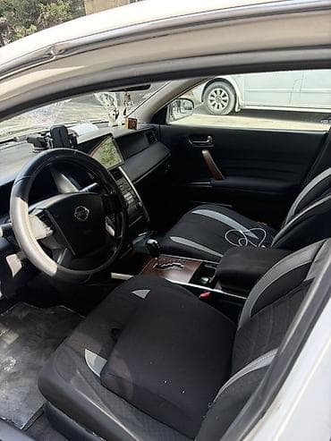 nissan versa: Nissan Teana, ağ rəngdə sedan Texniki xüsusiyyətlər: - Kuzov: sedan — 8