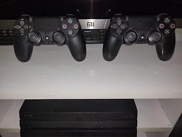 ps4 slim disk: Sony PlayStation 4 Pro (PS4 Pro) oyun konsolu + 2 ədəd DualShock 4 — 2